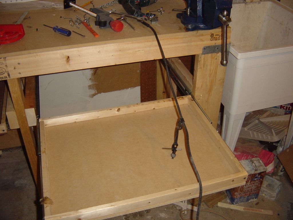 
Demonstration of full extension shelf-drawers.
