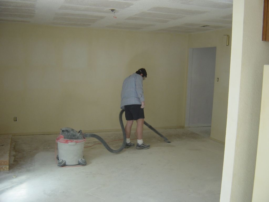 
Adam is vacuuming.
