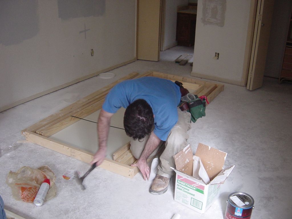 
Evanda assembling the door frame

