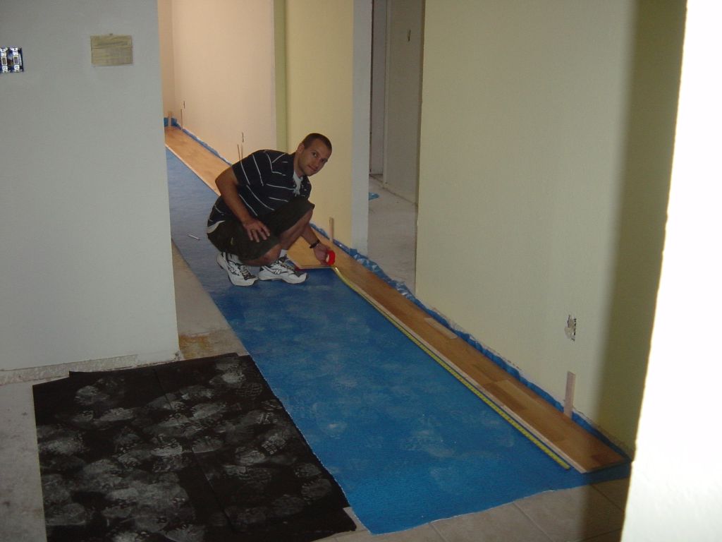 
Rick measures the length of the next piece of flooring to go in
