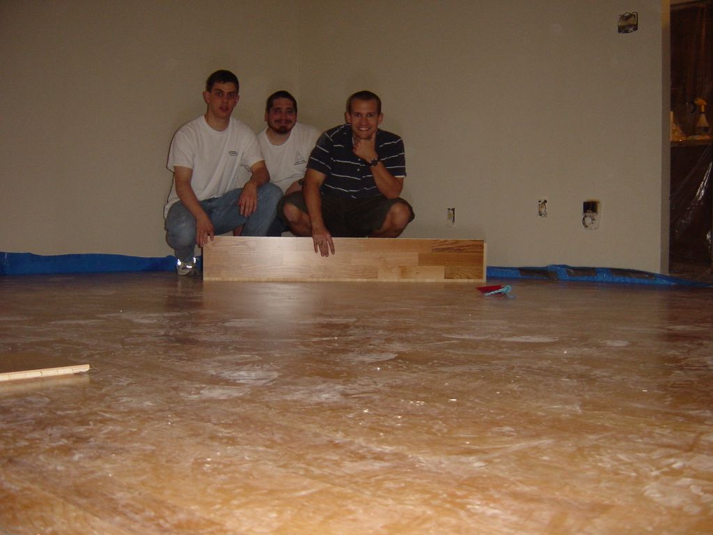 
Matt, Rick, and Erich, finished in the family room. 
The floor has obviously not been cleaned yet.
