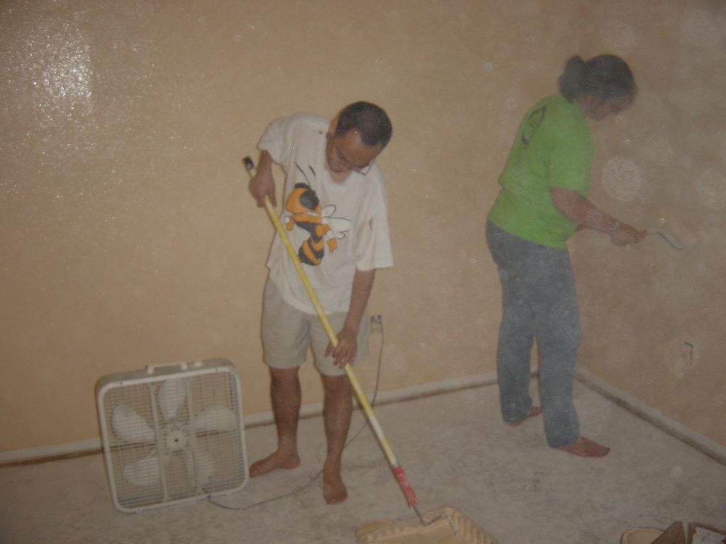 
Jason and Gwyneth putting on the second coat in the front bedroom
