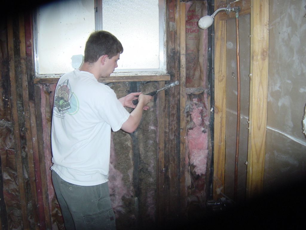 
Matt starting to rip out the rotten studs
