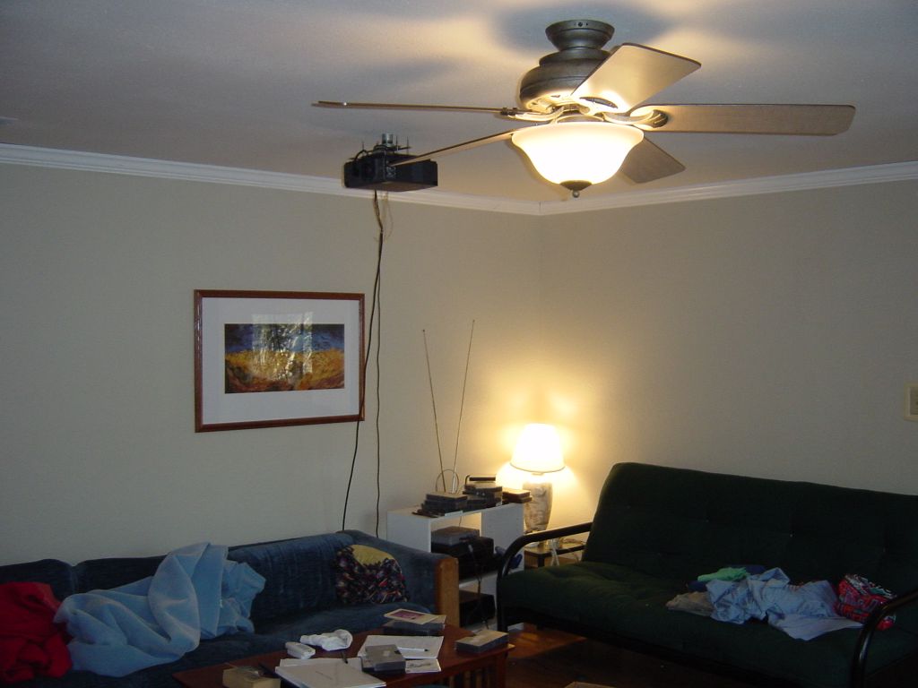 

Another picture of the back family room.  My roommates and I sure are messy!
I think all three of us have been doing laundry, that is part of the problem.

