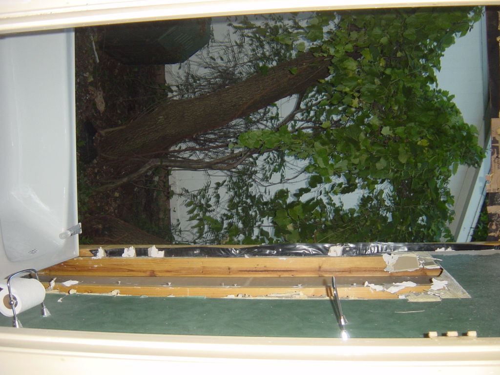 
Wall removed; new bathtub in place.  These things are really heavy (350lb).
