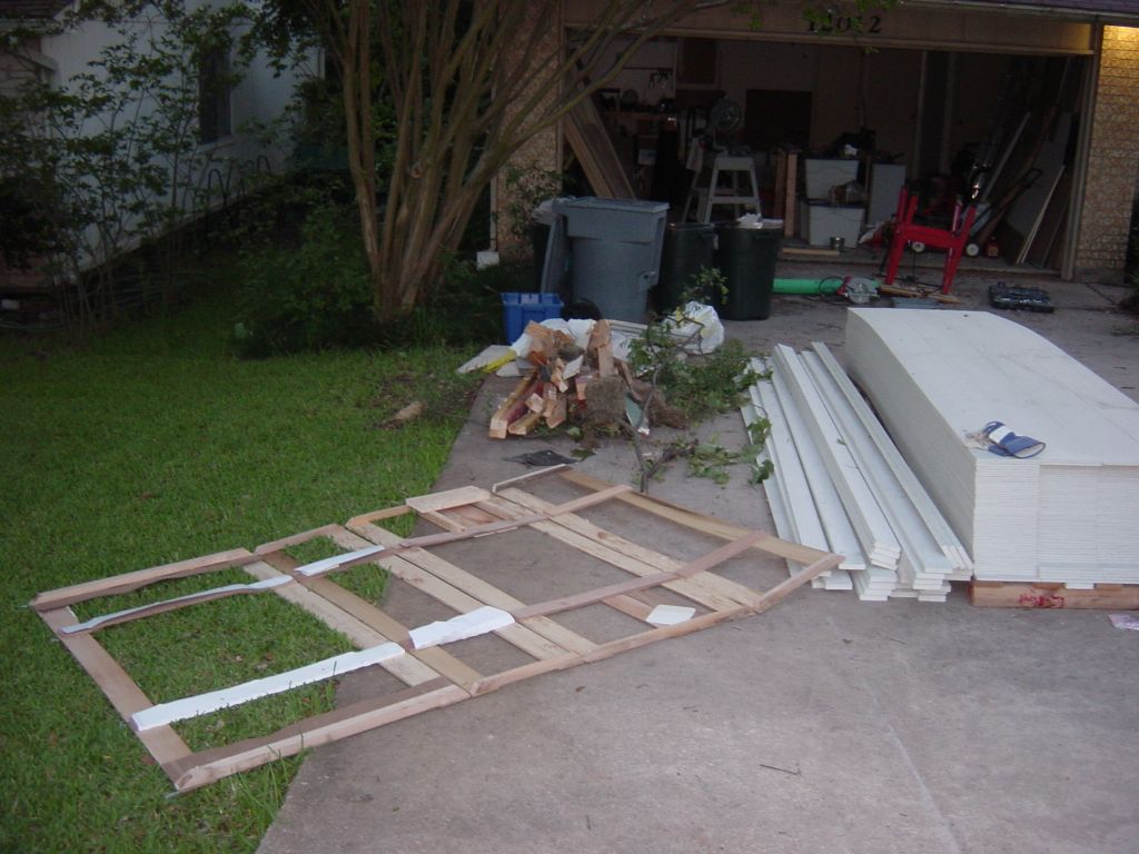 
New siding is delivered, you can see the demolished wall next to it.
You can also see the crating that the bathtub came in.

