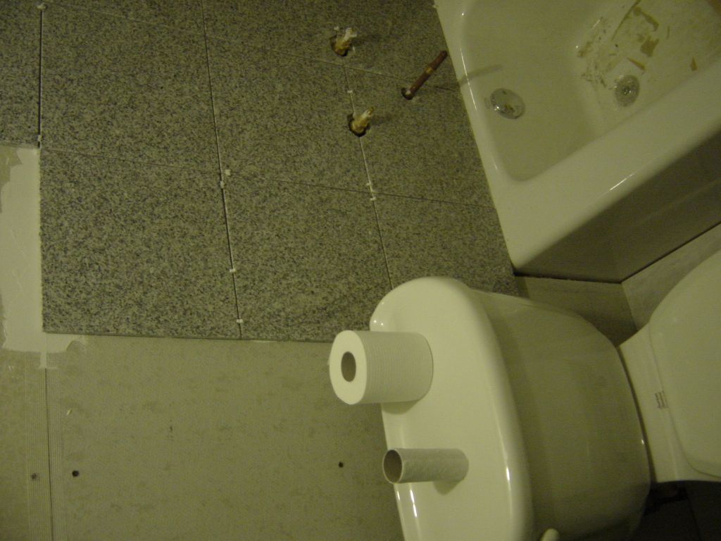 
New bathroom work.  Granite in progress.  I like the new granite.
